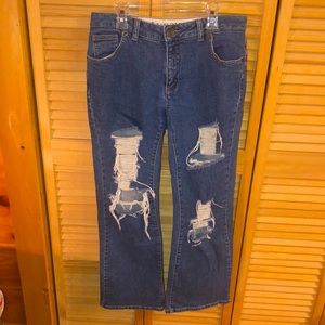 Ripped boot leg jeans